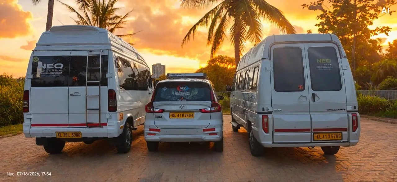 Neo Travel Mart Kerala premium taxi fleet with Force Urbania, Ertiga and tempo traveller rear view